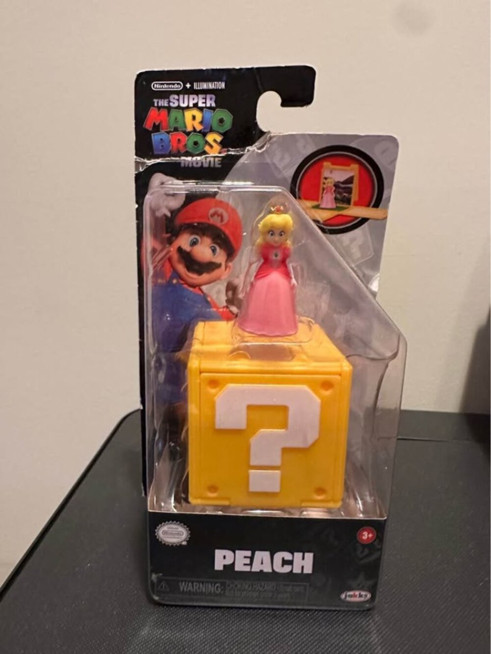 Princess Peach figure. Distressed box.